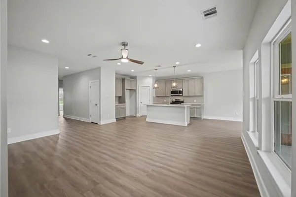 a view of kitchen with wooden floor