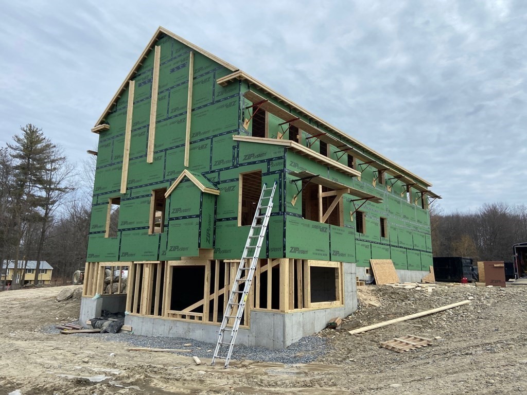 68 Little Turnpike Road Shirley, MA 01464 - Photo 2 of 40 a view of a house with a park