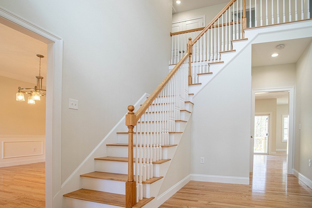 68 Little Turnpike Road Shirley, MA 01464 - Photo 6 of 40 a view of entryway with wooden floor and stairs