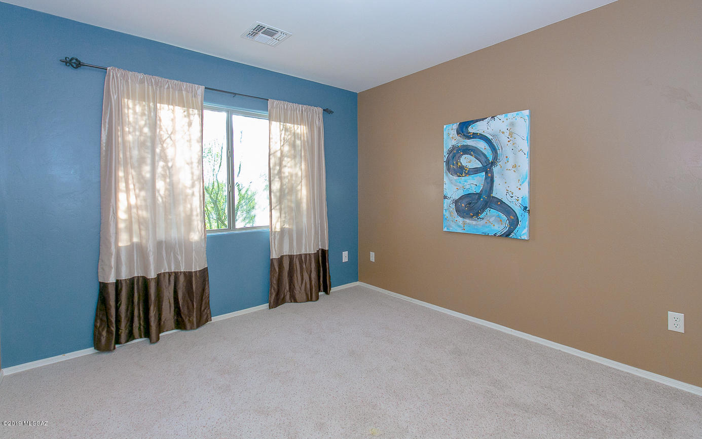 39103 Winners Circle Tucson, AZ 85739 - Photo 10 of 19 a view of an empty room with a window