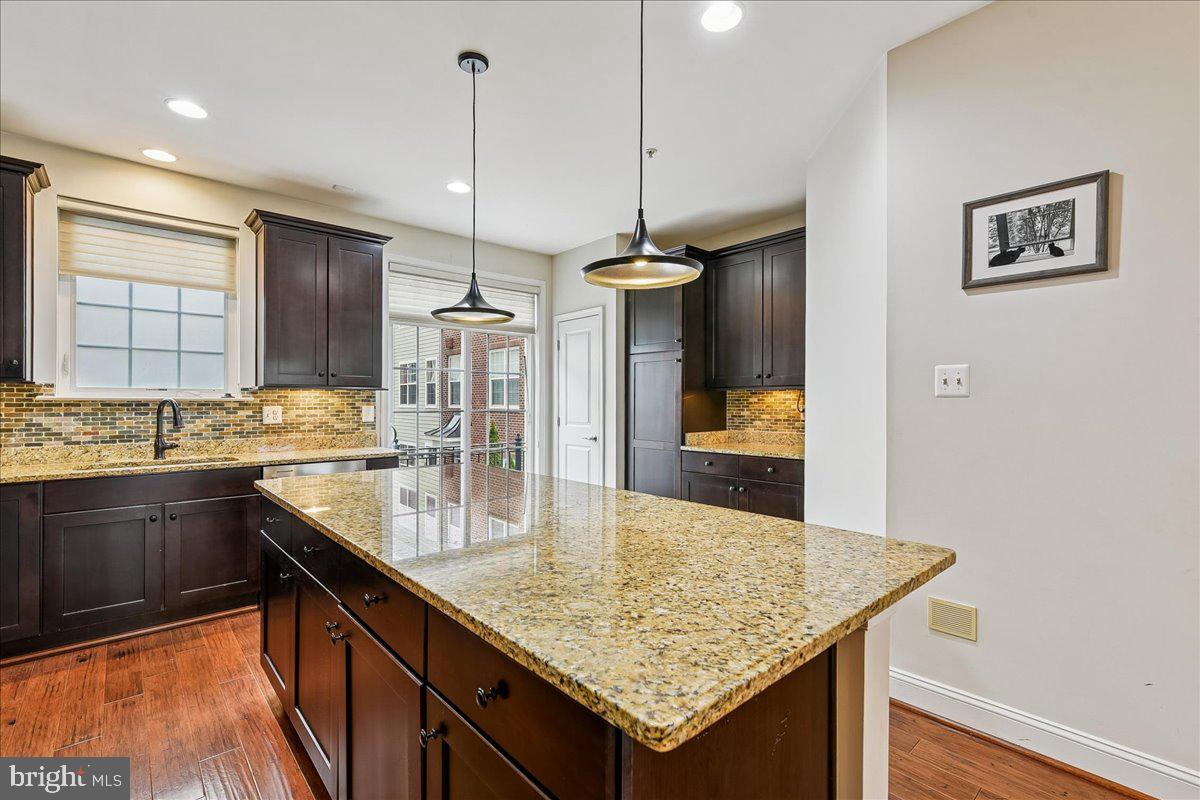 105 Meridian Lane Towson, MD 21286 - Photo 14 of 56 a kitchen with center island and countertop