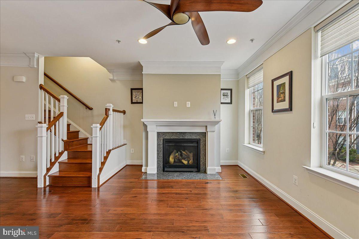 105 Meridian Lane Towson, MD 21286 - Photo 23 of 56 a living room with wooden floors and a fireplace