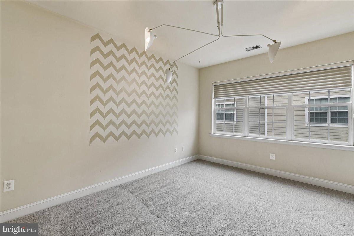 105 Meridian Lane Towson, MD 21286 - Photo 25 of 56 a view of an empty room with a window