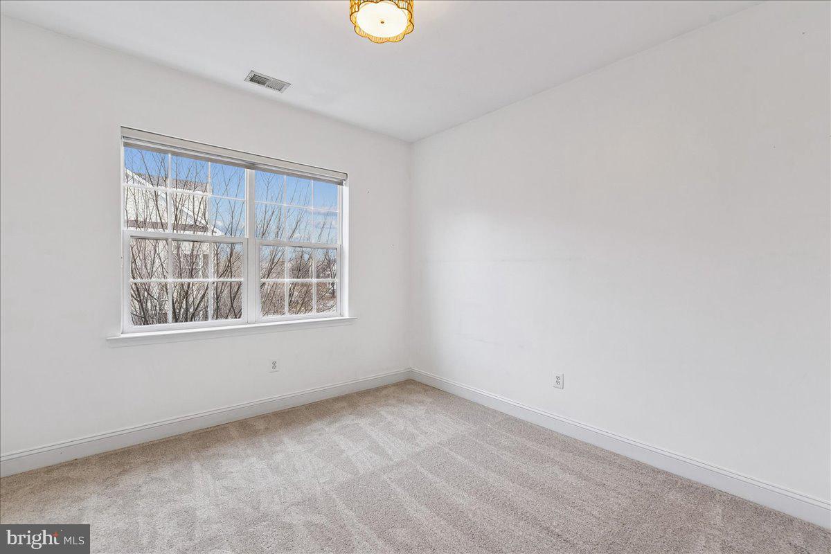 105 Meridian Lane Towson, MD 21286 - Photo 26 of 56 an empty room with windows