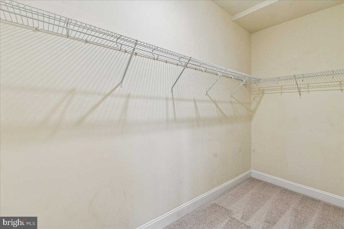 105 Meridian Lane Towson, MD 21286 - Photo 29 of 56 a view of a room with racks on the wall