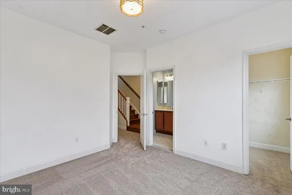 a view of a room with racks on the wall