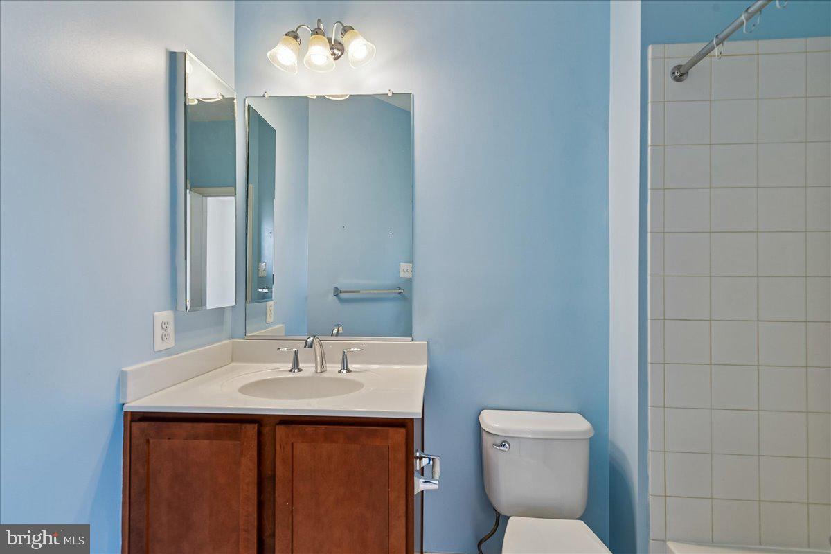 105 Meridian Lane Towson, MD 21286 - Photo 33 of 56 a bathroom with a toilet sink and mirror