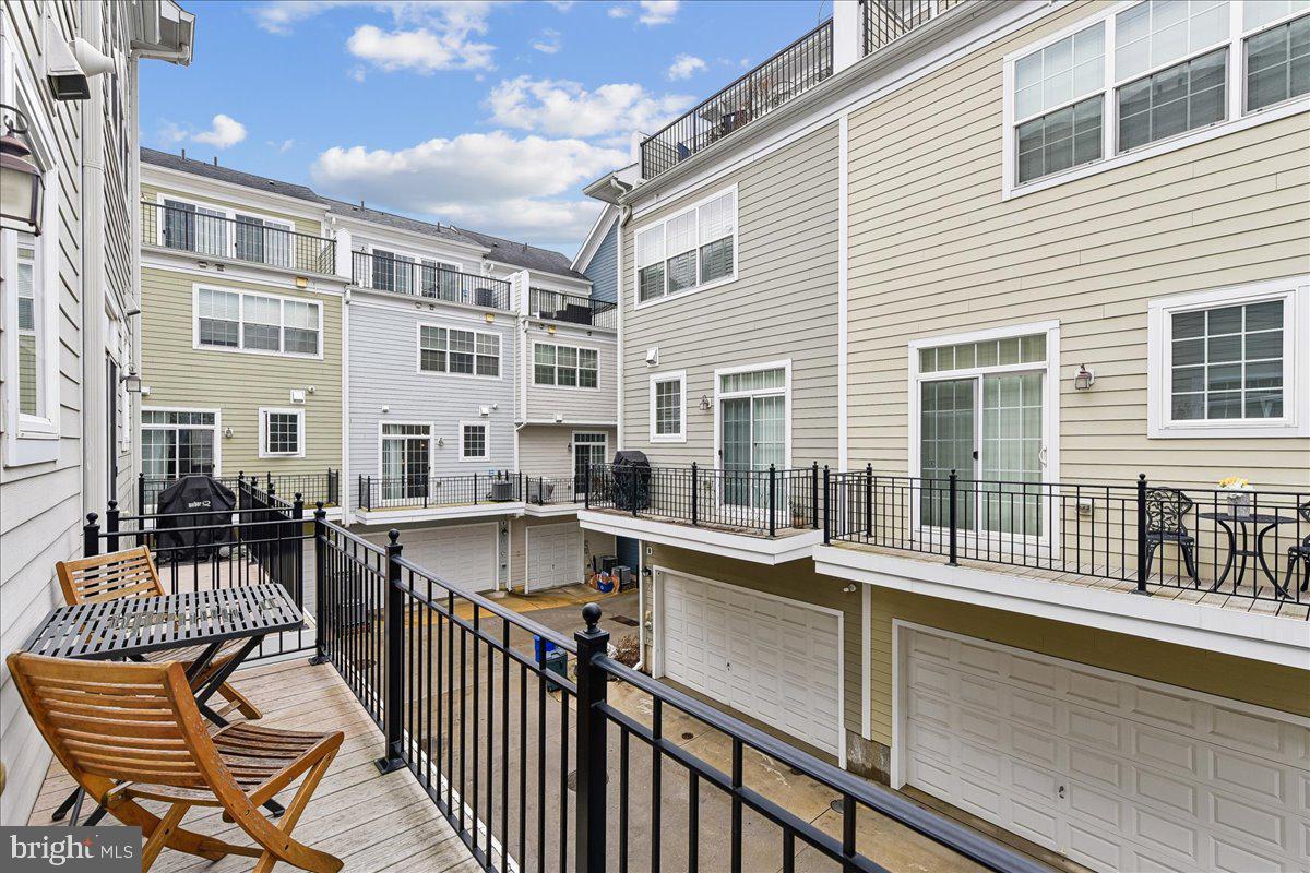 105 Meridian Lane Towson, MD 21286 - Photo 40 of 56 a view of a chairs and table in the balcony