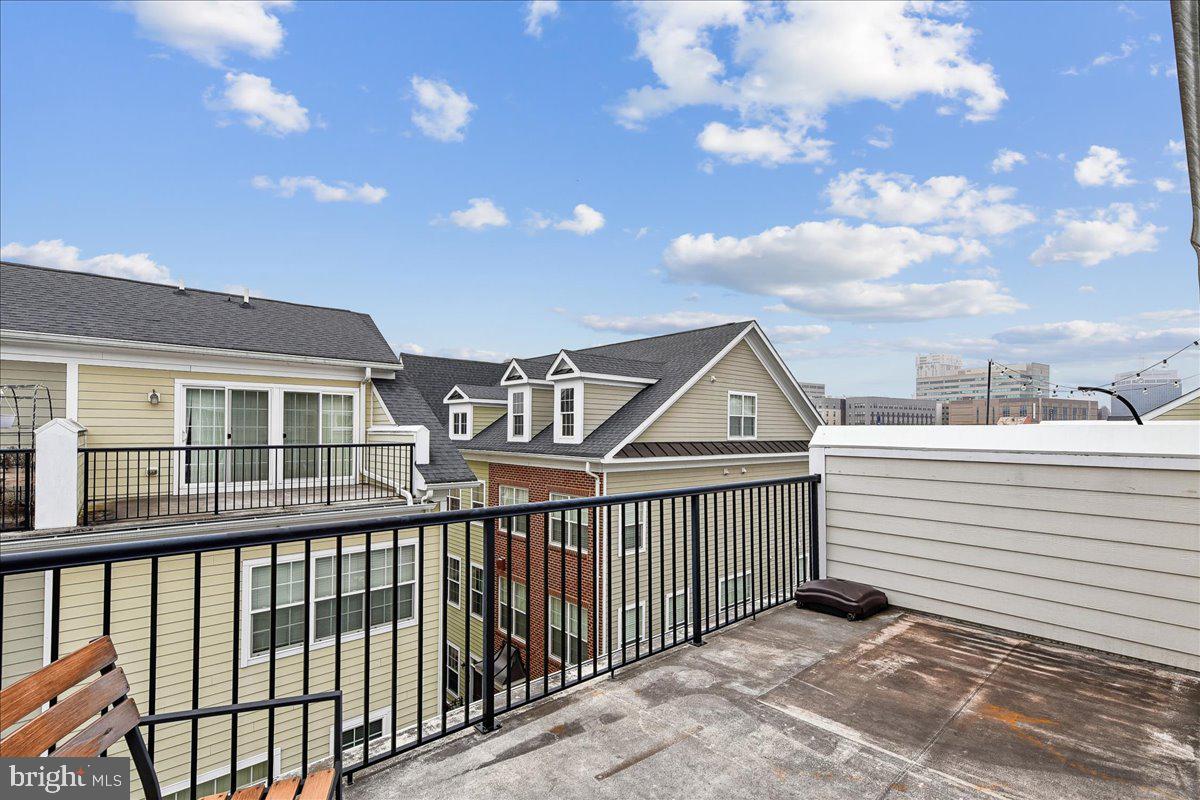 105 Meridian Lane Towson, MD 21286 - Photo 43 of 56 a view of a brick house with a balcony