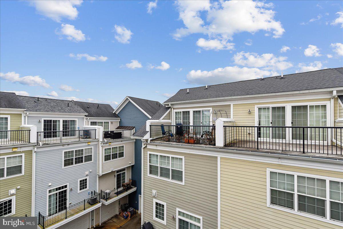 105 Meridian Lane Towson, MD 21286 - Photo 51 of 56 a large white building with a lot of windows