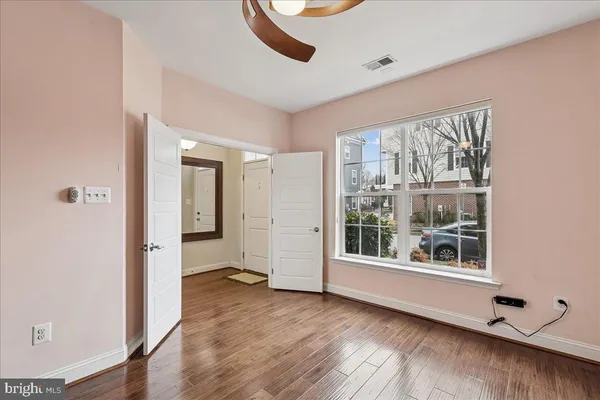a view of a livingroom with wooden floor