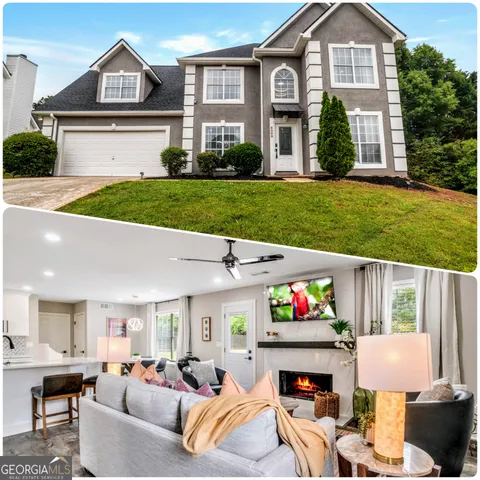 a living room with fireplace furniture and a flat screen tv