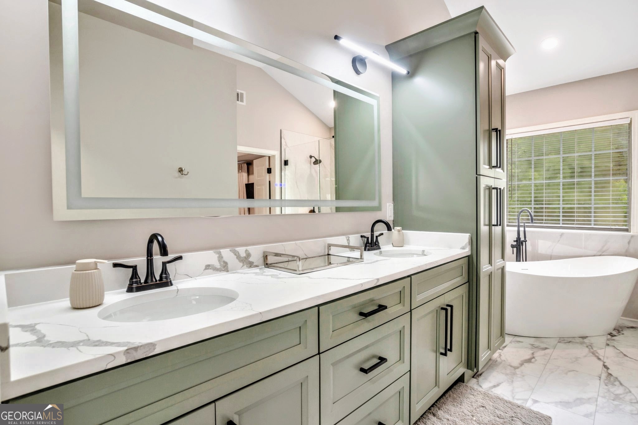 8008 Clearview Circle Riverdale, GA 30296 - Photo 23 of 31 a bathroom with a double vanity sink mirror and bathtub