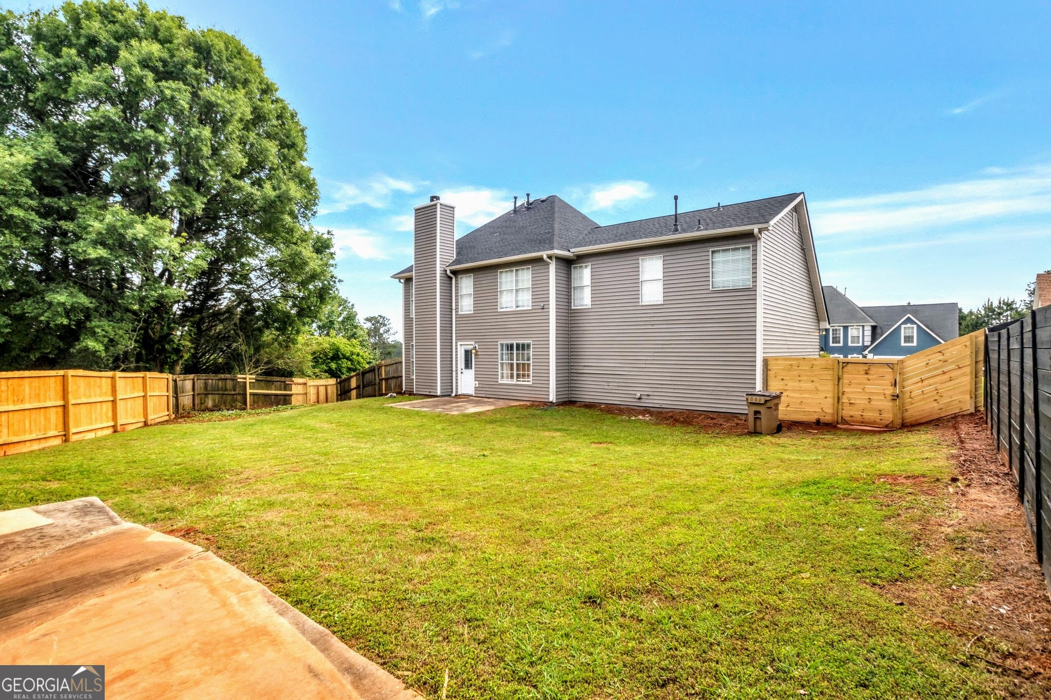 8008 Clearview Circle Riverdale, GA 30296 - Photo 27 of 31 a front view of a house with a yard