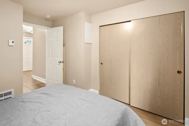 a view of a bathroom with a shower and a sink