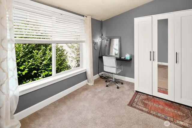 a view of a room with a window and outside view