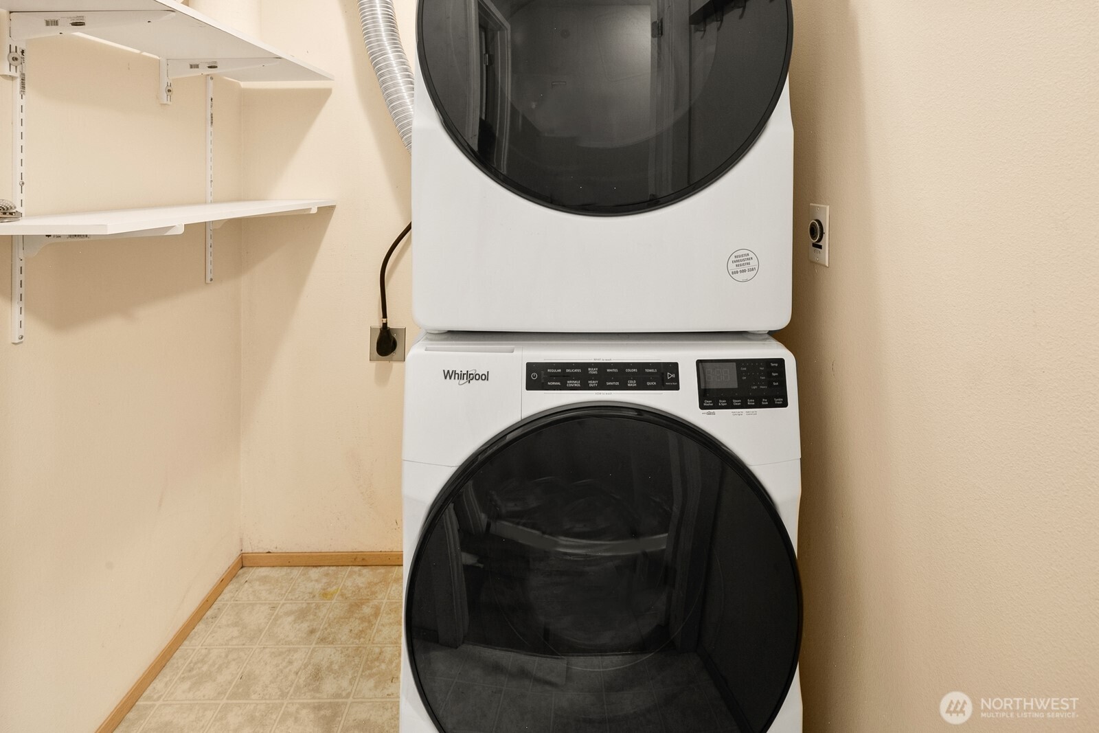 3224 21st Avenue West, Unit B Seattle, WA 98199 - Photo 16 of 17 a utility room with dryer and washer