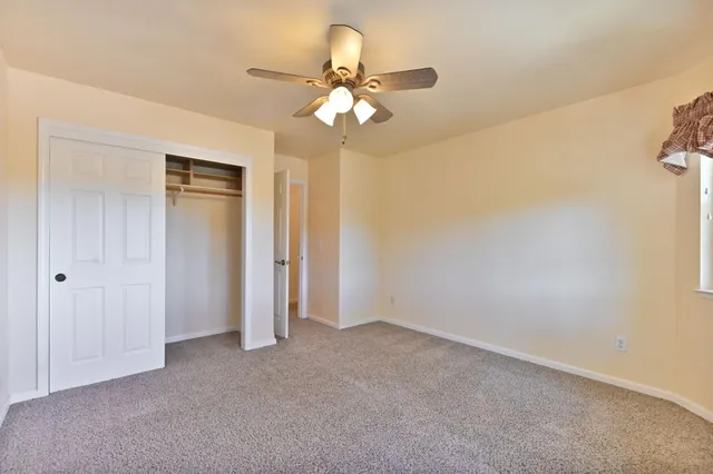 a white refrigerator freezer sitting in a kitchen