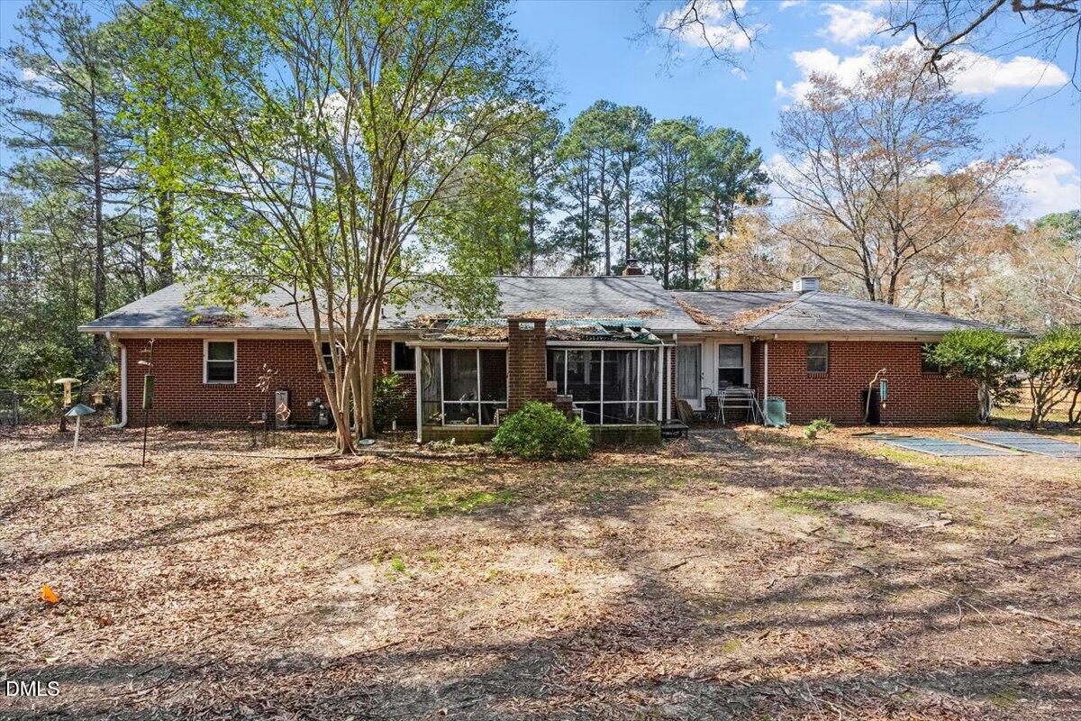 3107 Dixon Road Durham, NC 27707 - Photo 31 of 35 a front view of a house with a garden