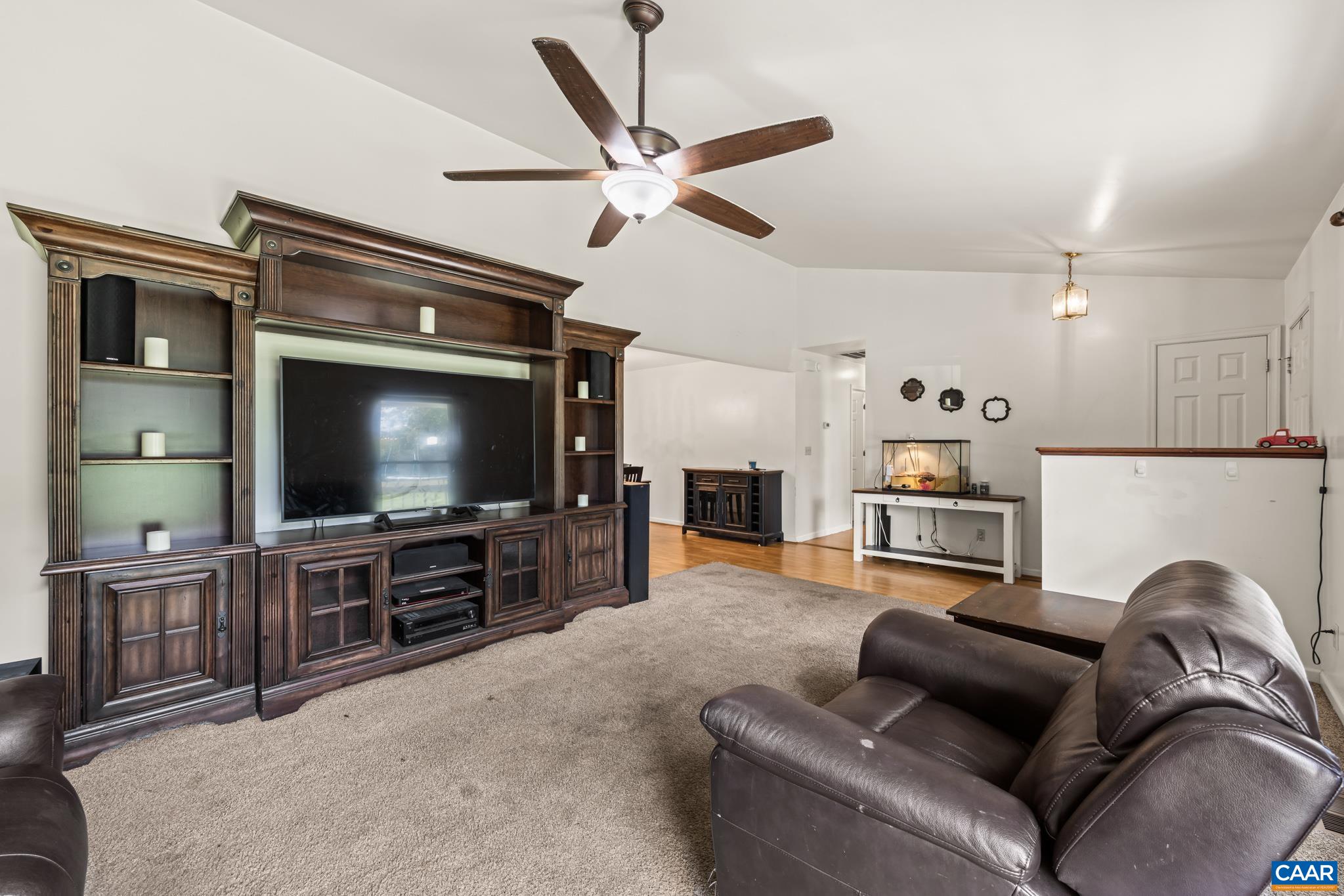 858 James River Road Scottsville, VA 24590 - Photo 11 of 33 a living room with furniture and a flat screen tv