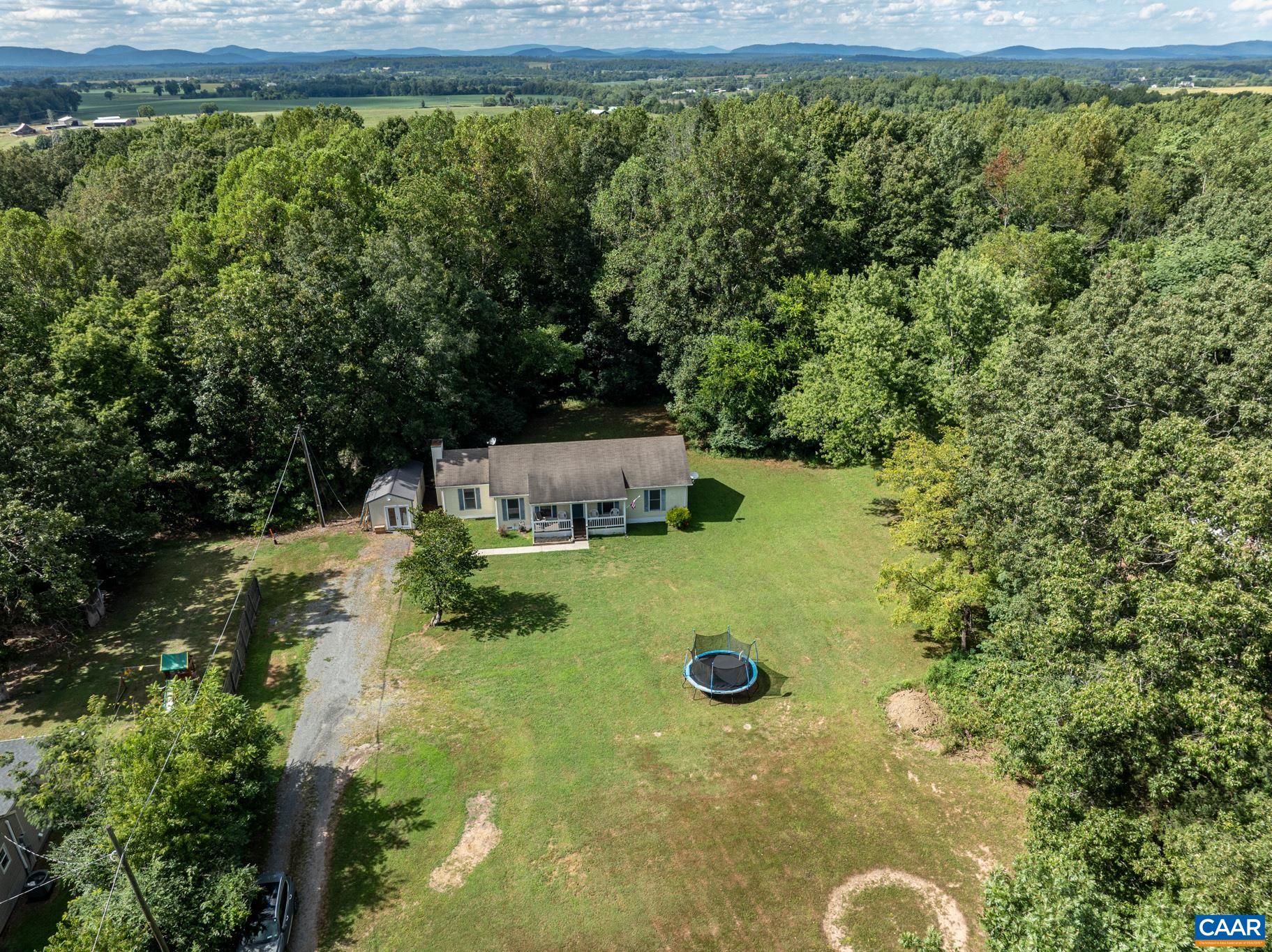 858 James River Road Scottsville, VA 24590 - Photo 26 of 33 a view of a yard with an outdoor space