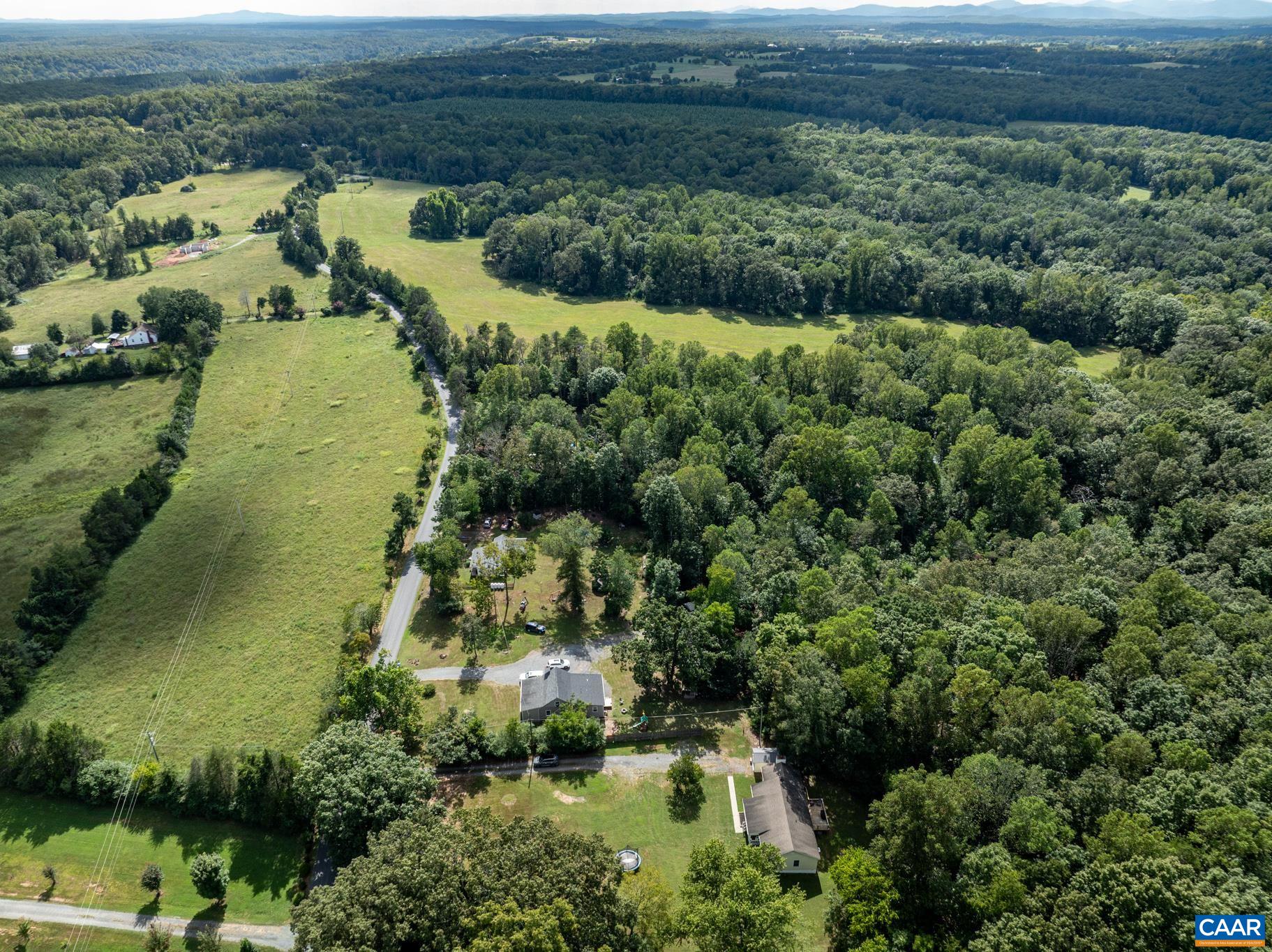 858 James River Road Scottsville, VA 24590 - Photo 29 of 33 an aerial view of residential house with outdoor space and trees all around