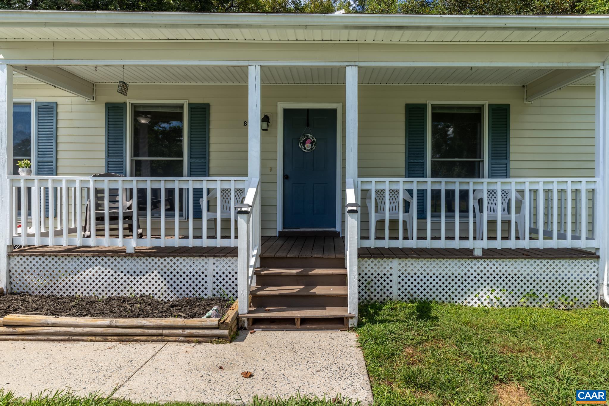 858 James River Road Scottsville, VA 24590 - Photo 3 of 33 a view of a deck with a chair
