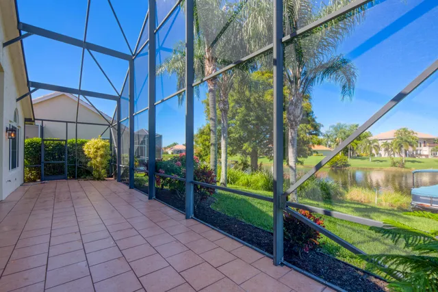 a view of a lake with a big yard