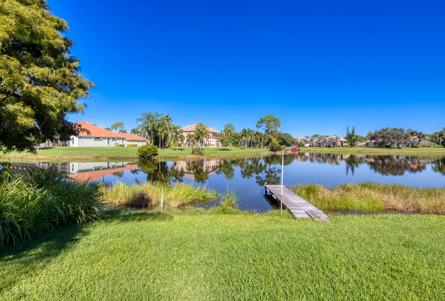a view of a garden with houses