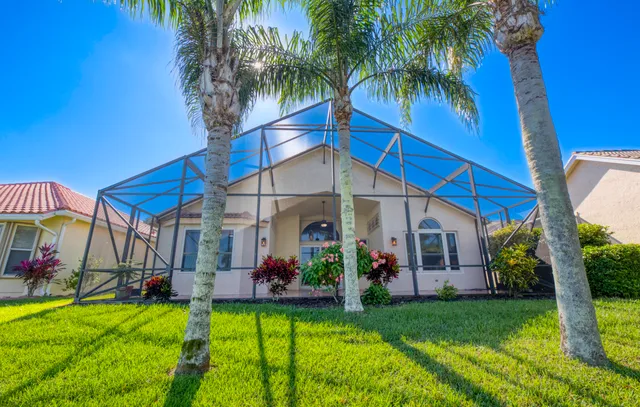 a view of a house with a swimming pool