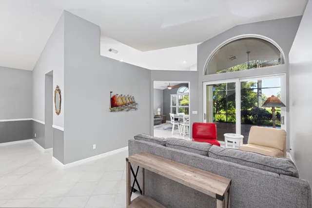 a living room with furniture and window
