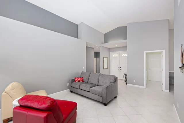 a living room with furniture and a couch