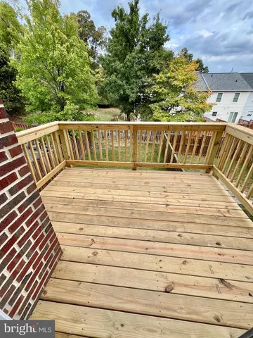a view of a house with a yard and front door