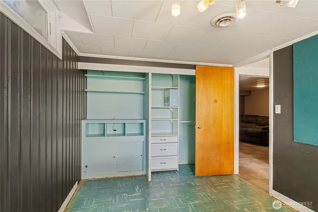 a view of a livingroom with furniture and windows