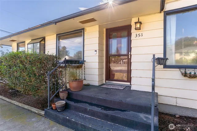 a front view of a house with a porch