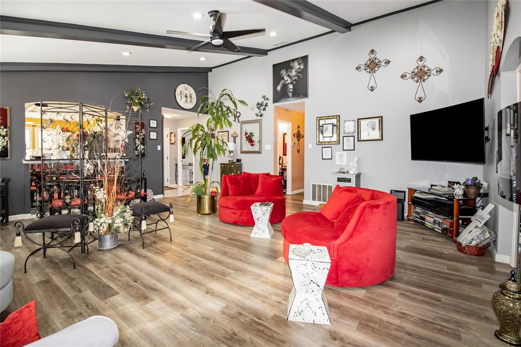 922 Hannah Way Dallas, TX 75253 - Photo 15 of 29 a living room with furniture and a flat screen tv