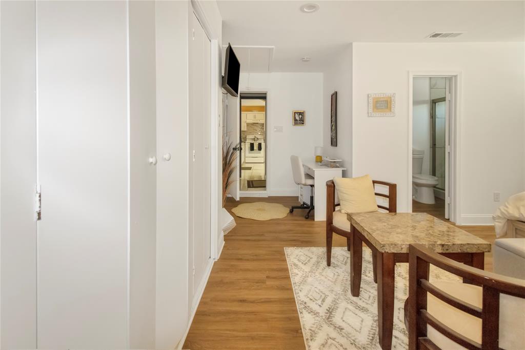 922 Hannah Way Dallas, TX 75253 - Photo 17 of 29 a view of a room with wooden floor and furniture