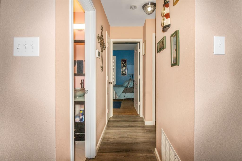922 Hannah Way Dallas, TX 75253 - Photo 20 of 29 a view of a hallway with wooden floor and staircase