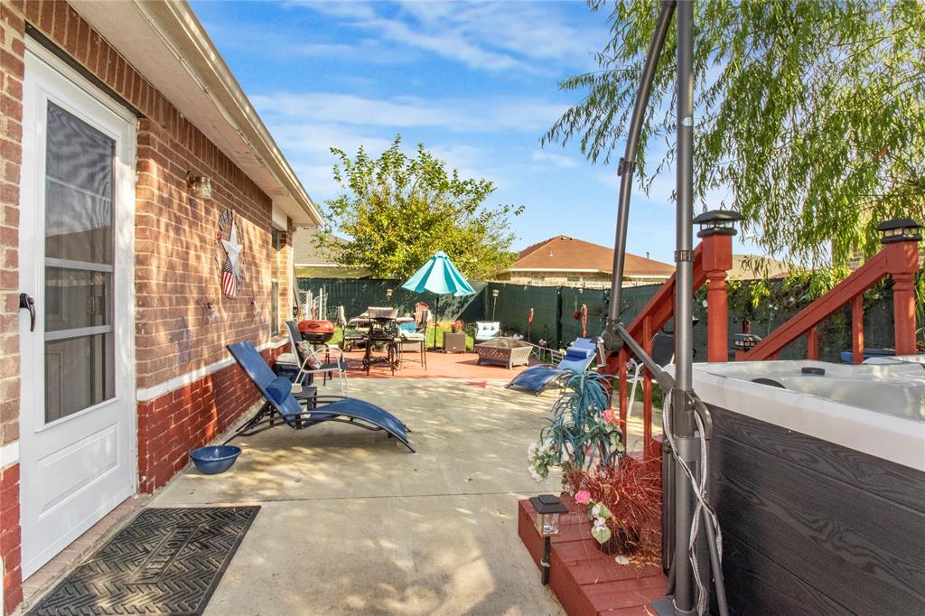 922 Hannah Way Dallas, TX 75253 - Photo 29 of 29 a view of a patio with swimming pool table and chairs