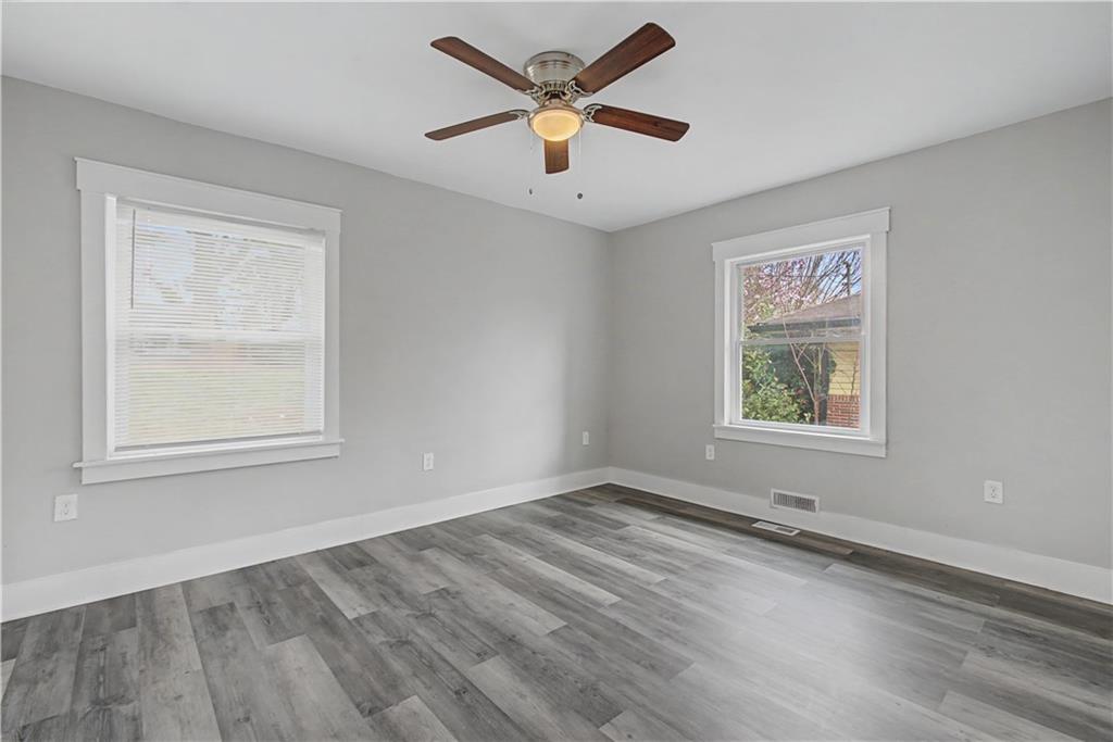 2835 Laguna Drive Decatur, GA 30032 - Photo 14 of 25 wooden floor in an empty room with a window