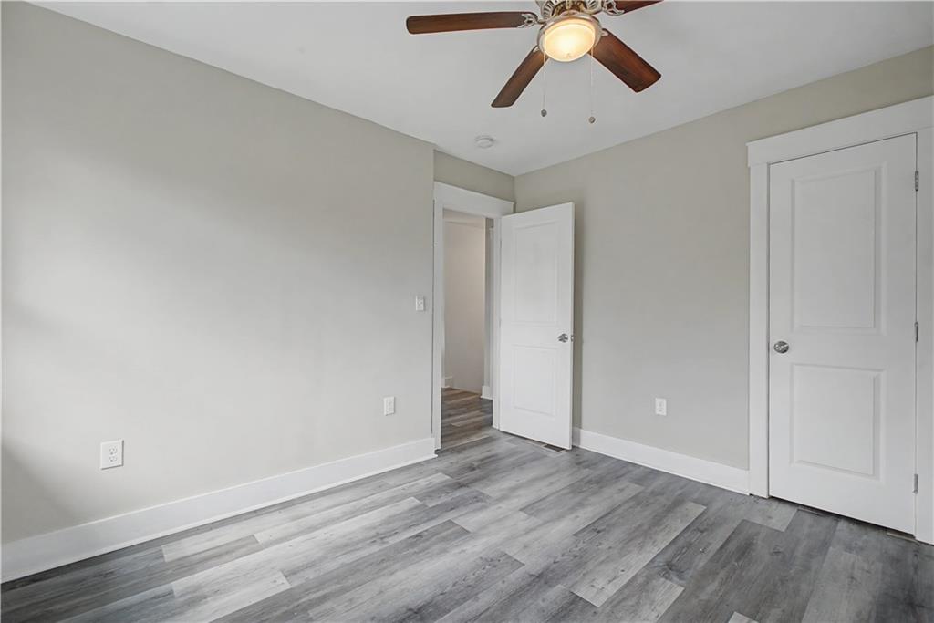 2835 Laguna Drive Decatur, GA 30032 - Photo 17 of 25 wooden floor in an empty room