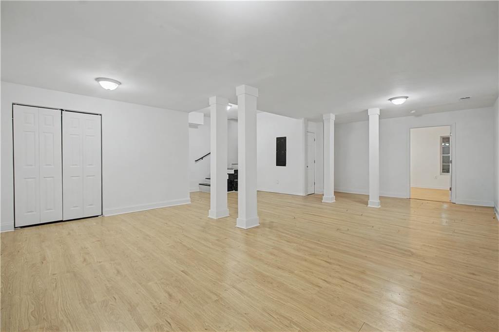 2835 Laguna Drive Decatur, GA 30032 - Photo 20 of 25 a view of an empty room with wooden floor