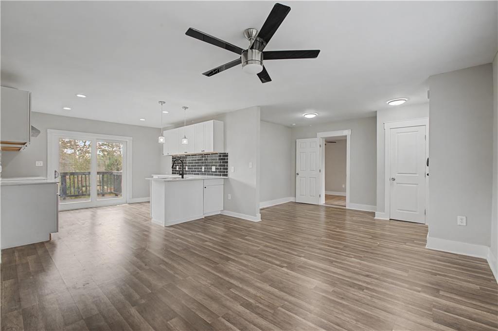 2835 Laguna Drive Decatur, GA 30032 - Photo 2 of 25 a view of empty room with wooden floor and window