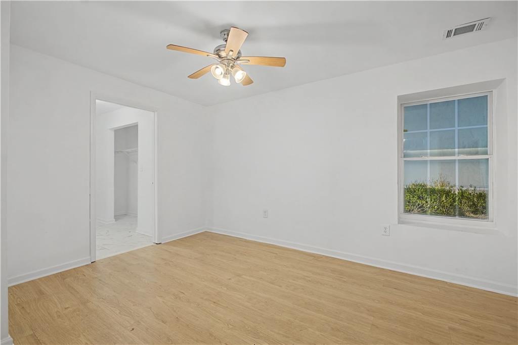 2835 Laguna Drive Decatur, GA 30032 - Photo 21 of 25 a view of an empty room with a window