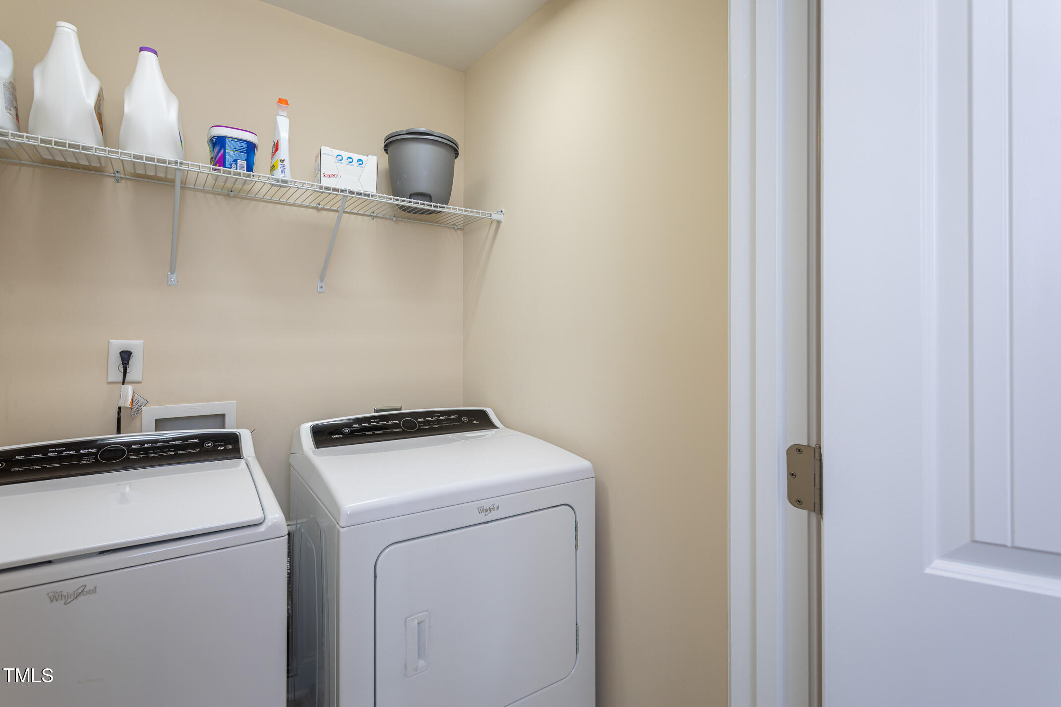 2411 Cattail Pond Drive Zebulon, NC 27597 - Photo 28 of 37 a utility room with dryer and washer