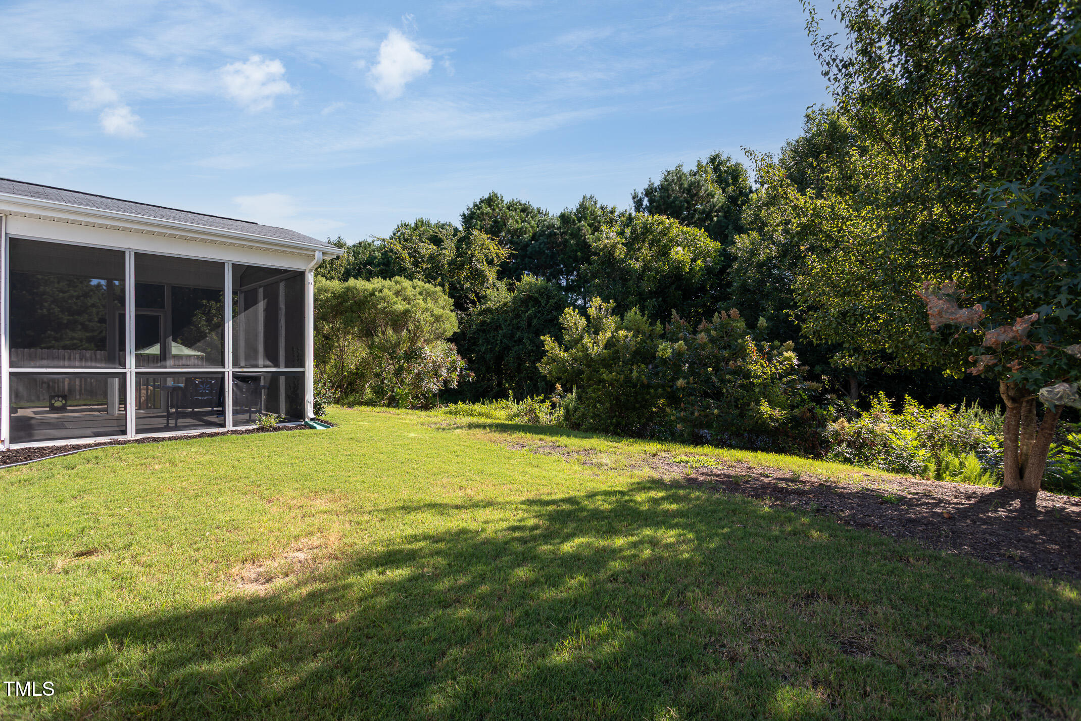 2411 Cattail Pond Drive Zebulon, NC 27597 - Photo 35 of 37 a view of an outdoor space and yard
