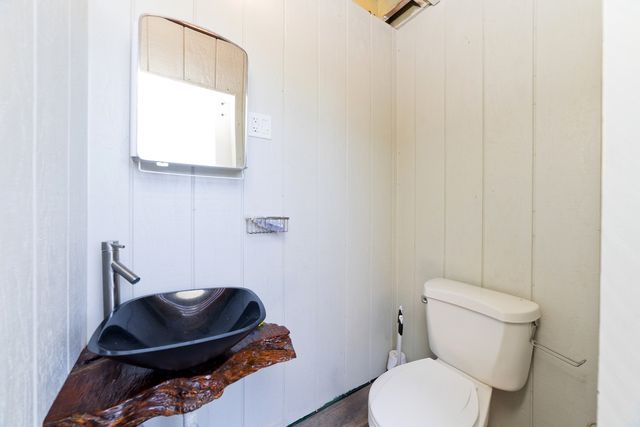 a bathroom with a toilet and a sink