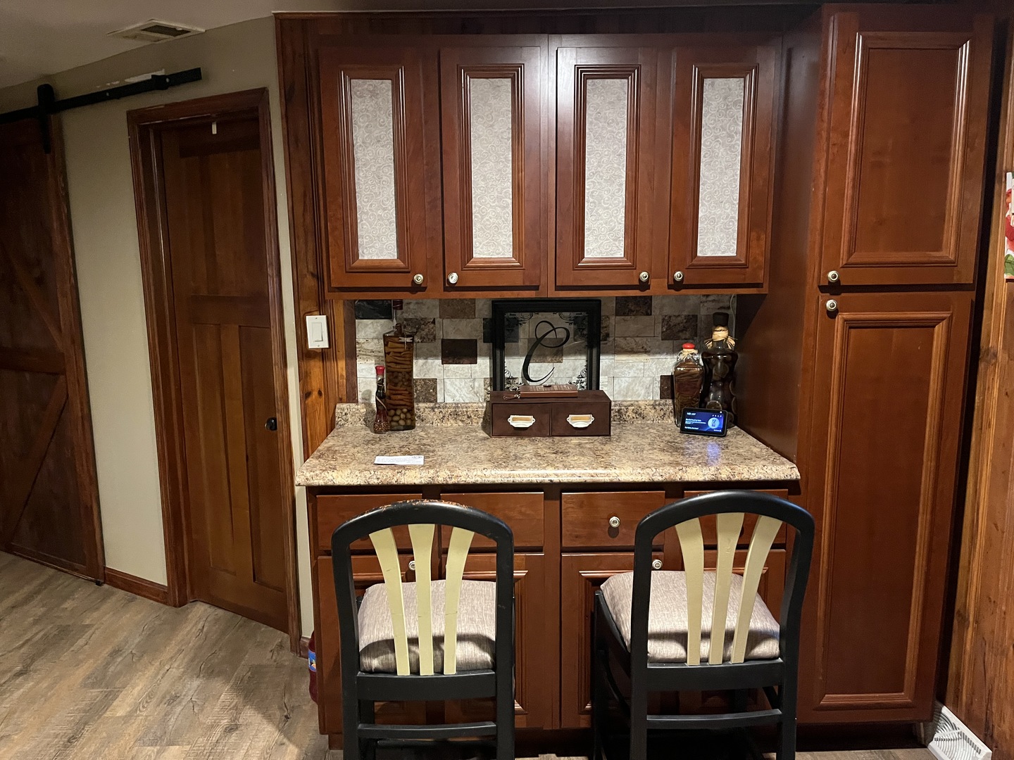 15213 Waverly Avenue Midlothian, IL 60445 - Photo 5 of 12 a kitchen with stainless steel appliances granite countertop a refrigerator a sink and wooden cabinets