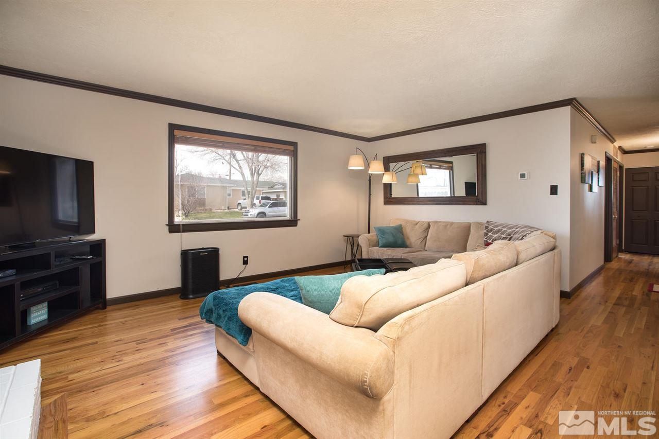 2890 Judith Lane Reno, NV 89503 - Photo 5 of 25 a living room with furniture and a flat screen tv