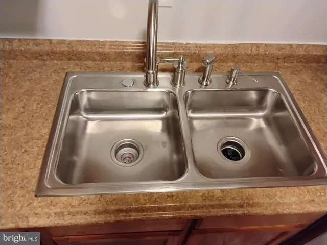 a closeup of a sink washer and dryer